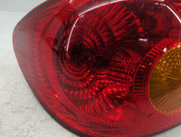 2003-2004 Toyota Corolla Tail Light Assembly Driver Left OEM Fits Fits 2003 2004 OEM Used Auto Parts - Oemusedautoparts1.com