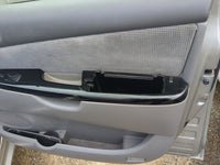 2004 Toyota Sienna Front Right Passenger Interior Door Panel Trim - Oemusedautoparts1.com