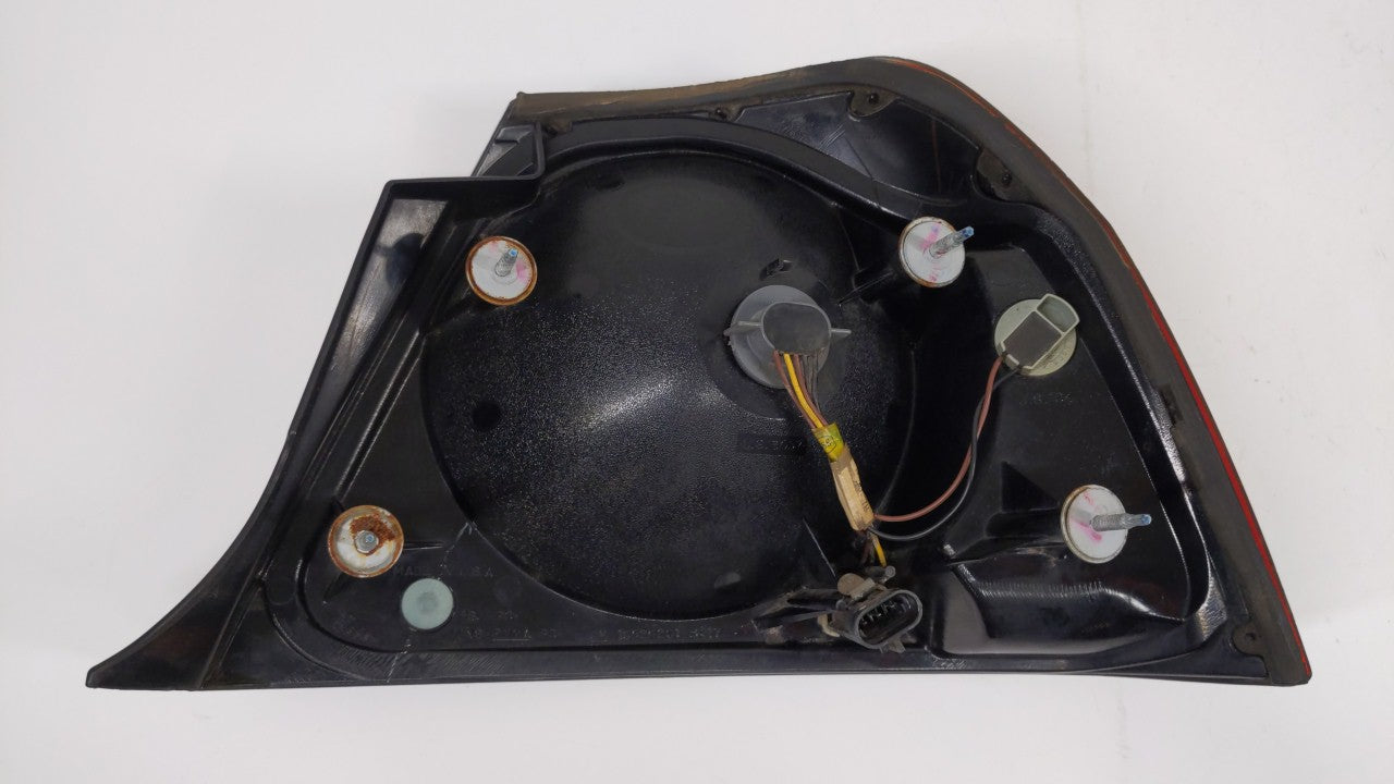 2004-2005 Chevrolet Impala Tail Light Assembly Driver Left OEM P/N:16525261 Fits Fits 2004 2005 OEM Used Auto Parts - Oemuse