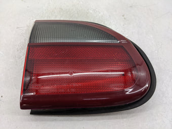 compare product 2005 Chevrolet Malibu Tail Light Assembly Driver Left OEM P/N:22605915 Fits OEM Used Auto Parts