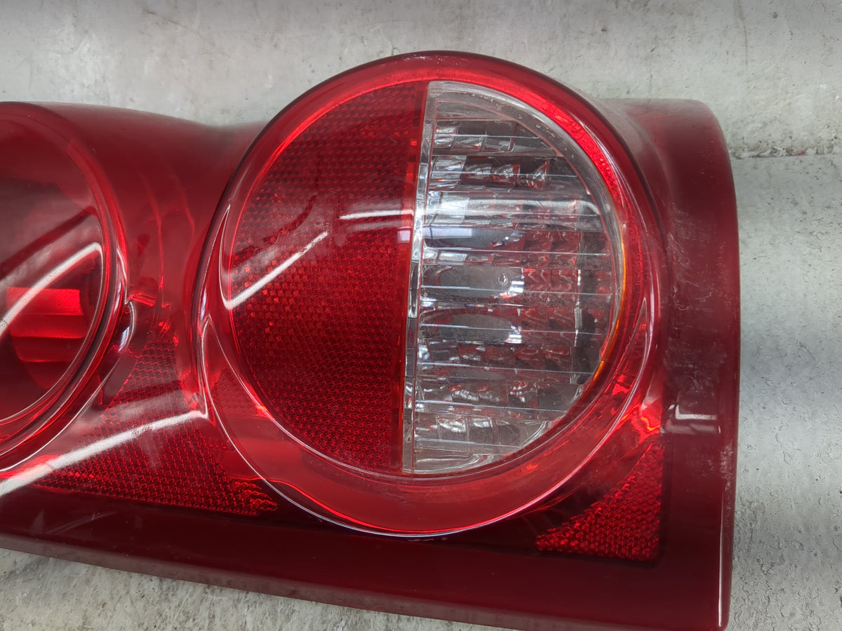 2005-2011 Dodge Dakota Tail Light Assembly Passenger Right OEM Fits Fits 2005 2006 2007 2008 2009 2010 2011 OEM Used Auto Pa