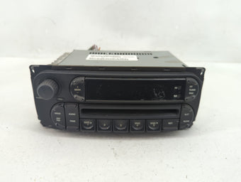 compare product 2002-2005 Dodge Ram 1500 Radio AM FM Cd Player Receiver Replacement P/N:FJ5A-12A650-UC Fits OEM Used Auto Parts