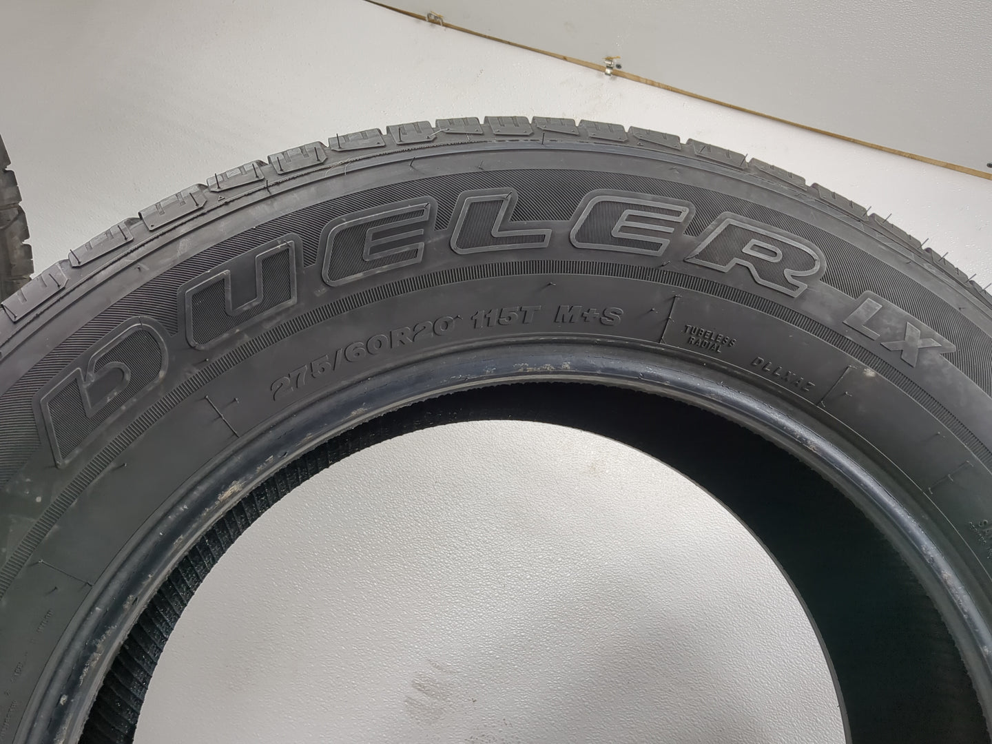 Used Tire 275/60R20 BRIDGESTONE DUELER LX 115T - Tread Depth 8/32 - Oemusedautoparts1.com