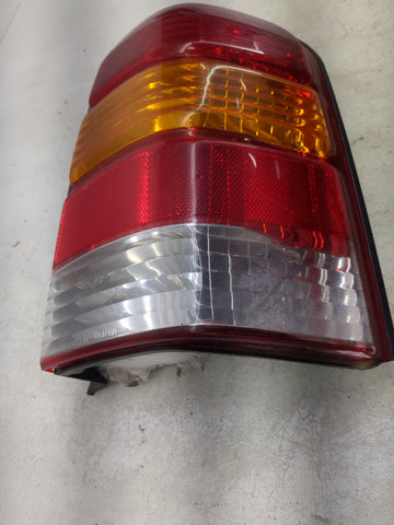2001-2007 Ford Escape Tail Light Assembly Passenger Right OEM P/N:4L84-13B504-D Fits Fits 2001 2002 2003 2004 2005 2006 2007 OEM Used Auto Parts