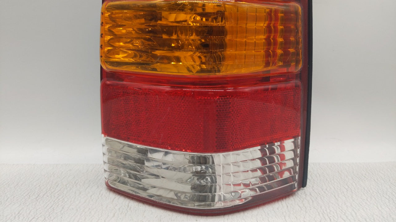 2001-2007 Ford Escape Tail Light Assembly Passenger Right OEM P/N:4L84-13B504-D Fits Fits 2001 2002 2003 2004 2005 2006 2007