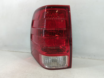 compare product 2005 Ford Expedition Tail Light Assembly Driver Left OEM P/N:2L1X-13B505-A Fits OEM Used Auto Parts