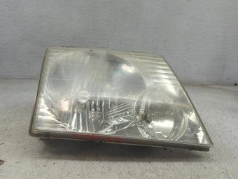 compare product 2005 Ford Explorer Passenger Right Oem Head Light Headlight Lamp 1500015