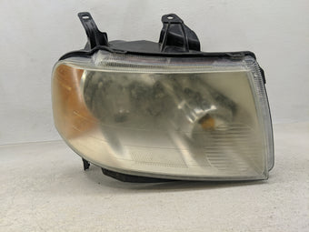 compare product 2005-2007 Ford Freestyle Passenger Right Oem Head Light Headlight Lamp