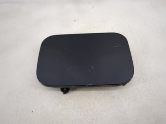 compare product 2005 Infiniti G35 Fuel Tank Door Lid Gas Tank Black