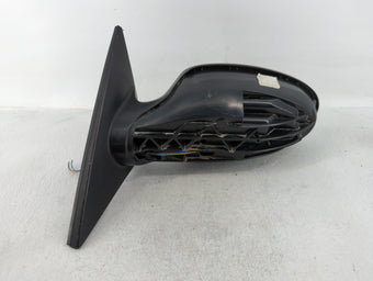 compare product 2005 Nissan Altima Driver Side View Mirror - Left Door Mirror OEM Used