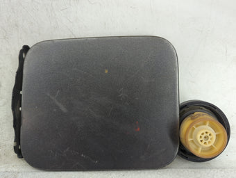 compare product 2005 Nissan Armada Fuel Tank Door Lid Gas Tank Grey