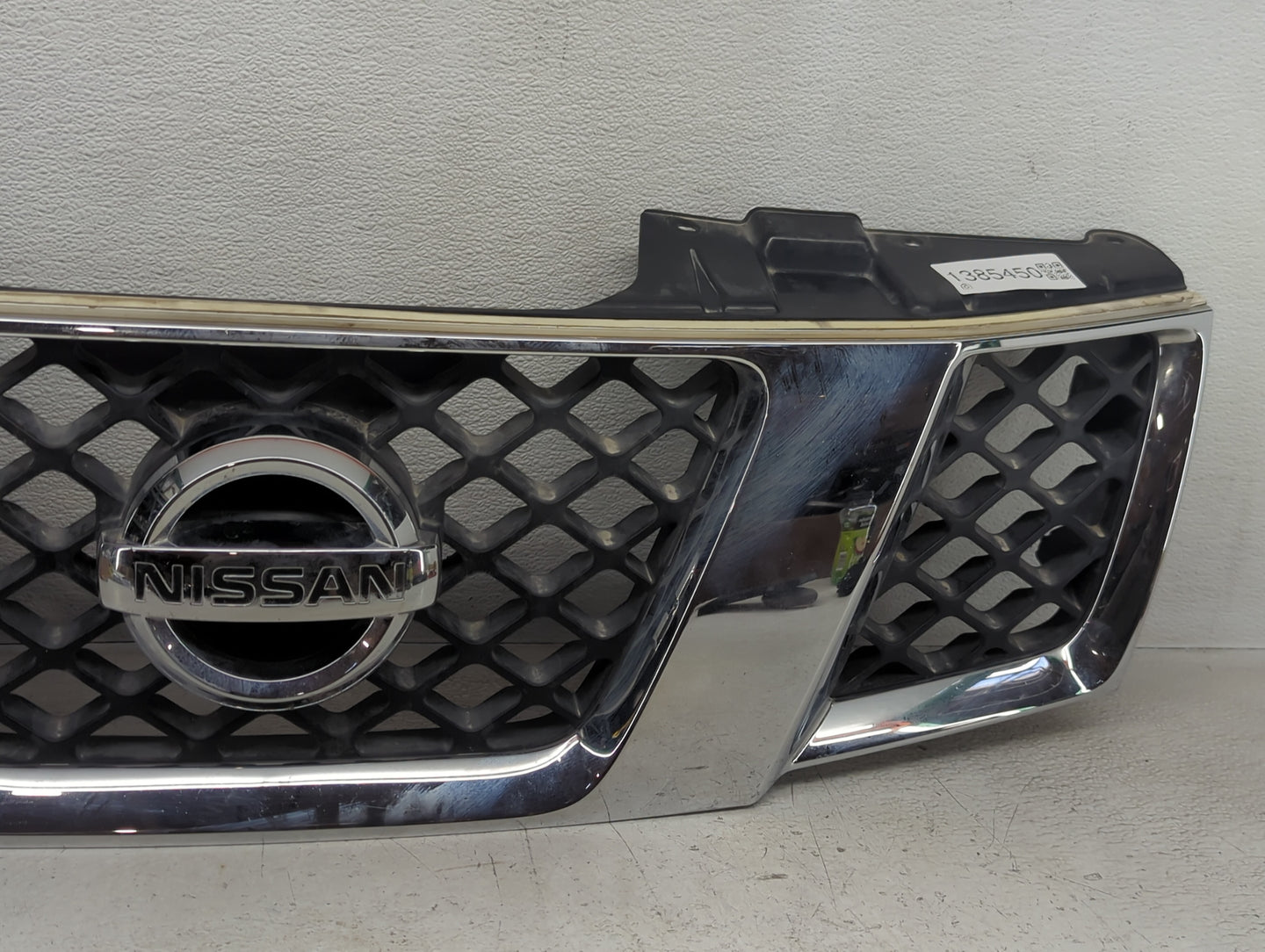 2005-2008 Nissan Frontier Front Grille Bumper Not Included - Oemusedautoparts1.com