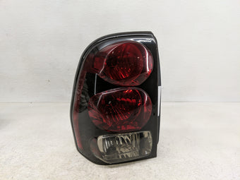 compare product 2002-2006 Chevrolet Trailblazer Ext Tail Light Assembly Driver Left OEM P/N:15131578 Fits OEM Used Auto Parts