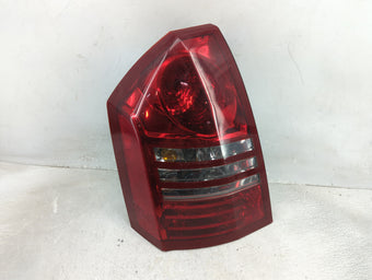 compare product 2006 Chrysler 300 Tail Light Assembly Driver Left OEM P/N:16238AT Fits OEM Used Auto Parts