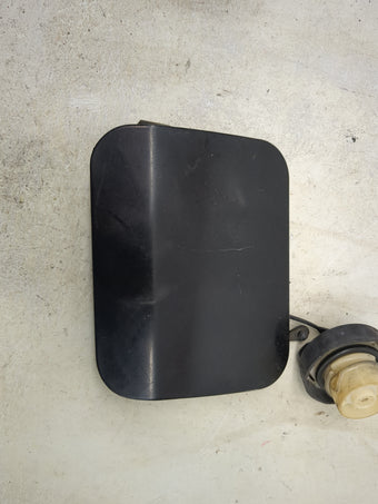 compare product 2006 Chrysler 300 Fuel Tank Door Lid Gas Tank Black 1515340