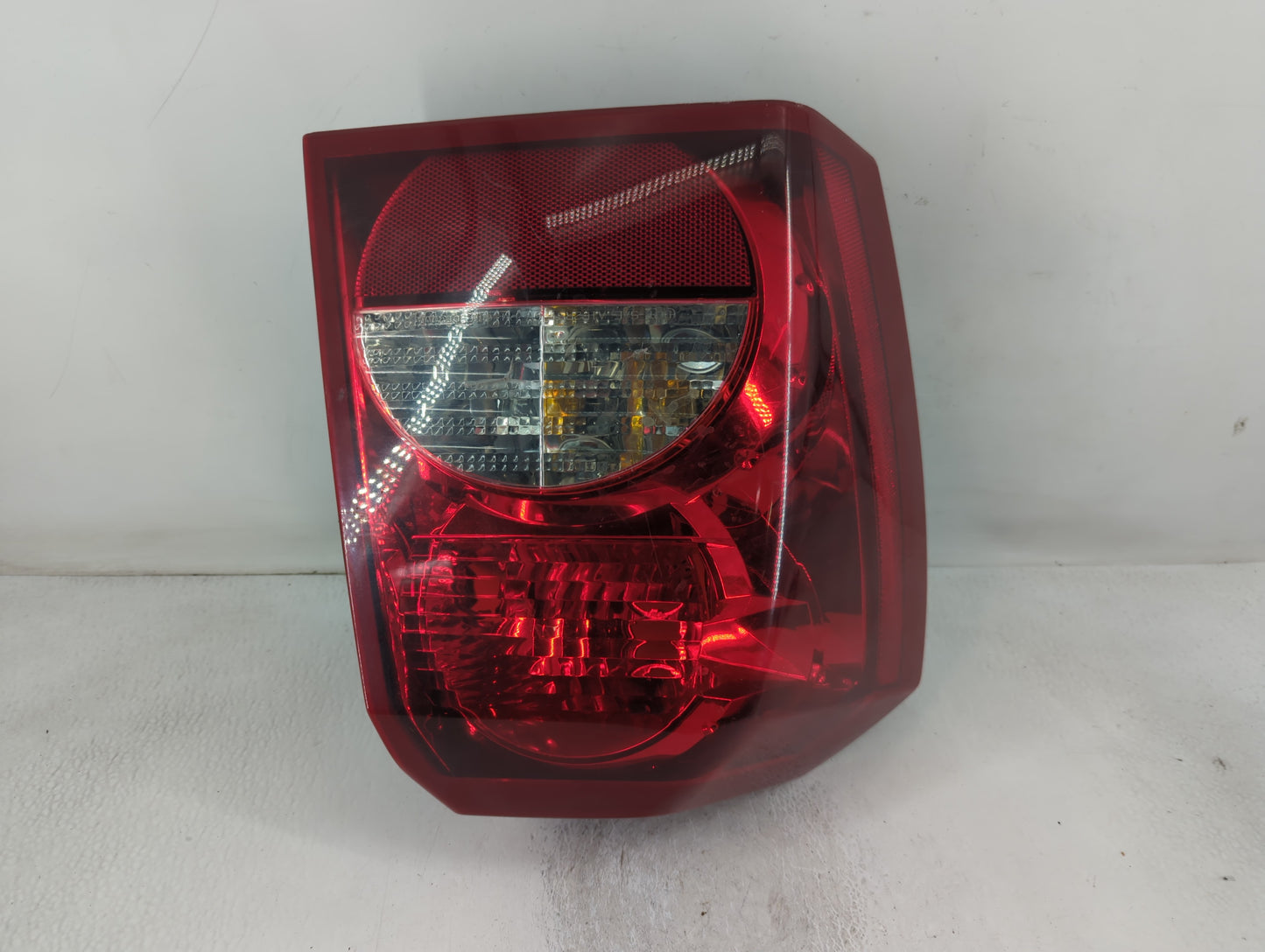 2006 Dodge Caliber Tail Light Assembly Driver Left OEM P/N:320077 Fits OEM Used Auto Parts - Oemusedautoparts1.com