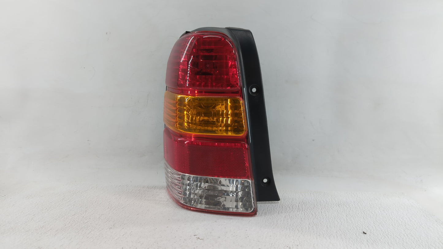 2001-2007 Ford Escape Tail Light Assembly Driver Left OEM P/N:4L84-13B505-D Fits Fits 2001 2002 2003 2004 2005 2006 2007 OEM