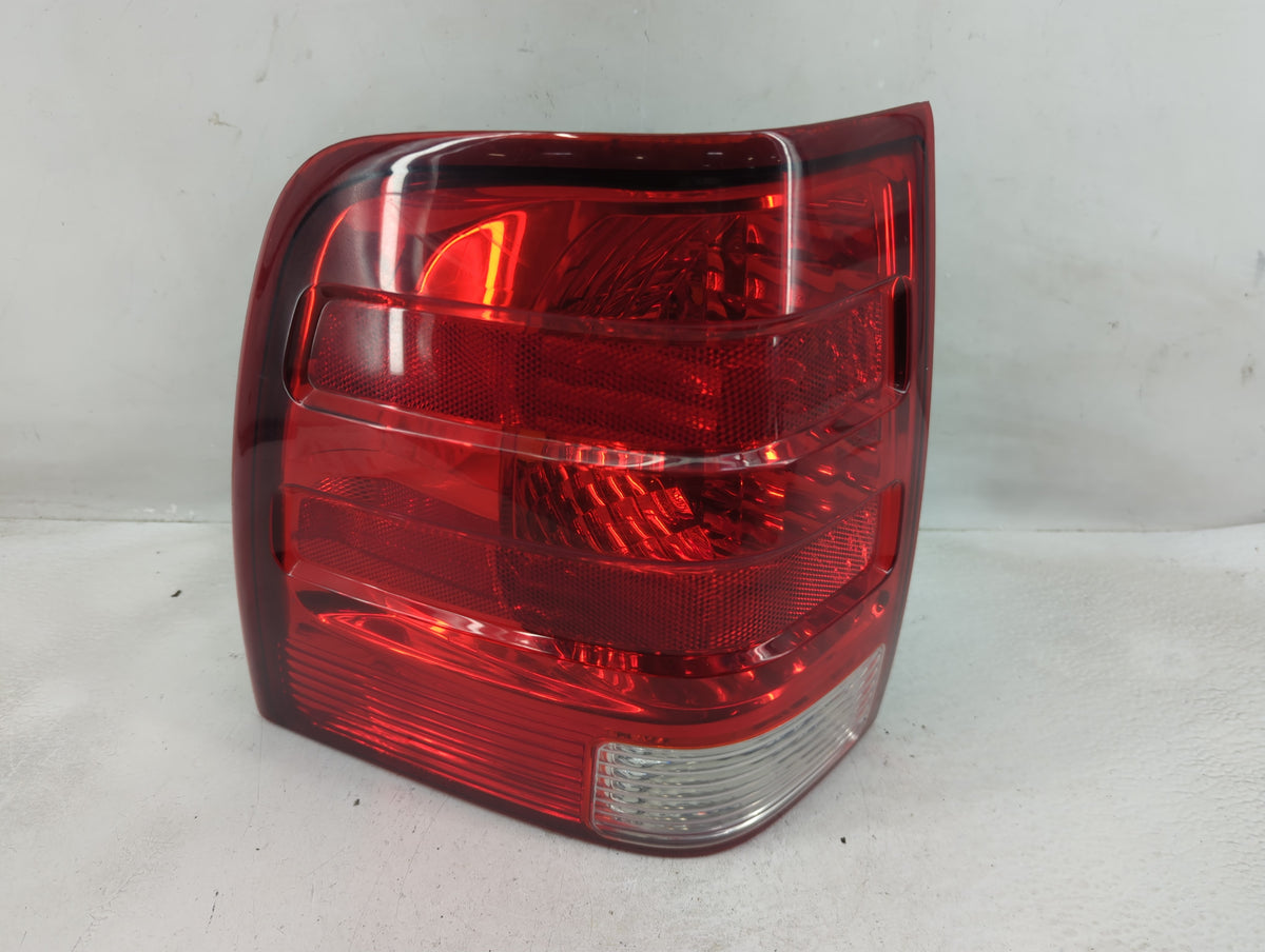 2003-2006 Ford Expedition Tail Light Assembly Driver Left OEM P/N:2LIX-13B505-A Fits Fits 2003 2004 2005 2006 OEM Used Auto 