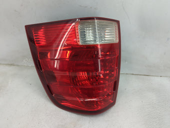 compare product 2006 Ford Expedition Tail Light Assembly Driver Left OEM P/N:2L1X-13B504-A Fits OEM Used Auto Parts