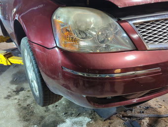 compare product 2005-2007 Ford Five Hundred Front Bumper - Oem