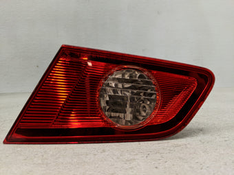 compare product 2005-2006 Infiniti G35 Tail Light Assembly Passenger Right OEM P/N:132-63790 220-63790 Fits Fits 2005 2006 OEM Used Auto Parts