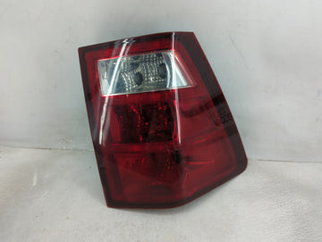2005-2006 Jeep Grand Cherokee Tail Light Assembly Driver Left OEM P/N:55156615AE Fits Fits 2005 2006 OEM Used Auto Parts - O
