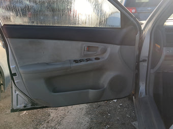 compare product 2006 Kia Spectra Front Left Driver Interior Door Panel Trim
