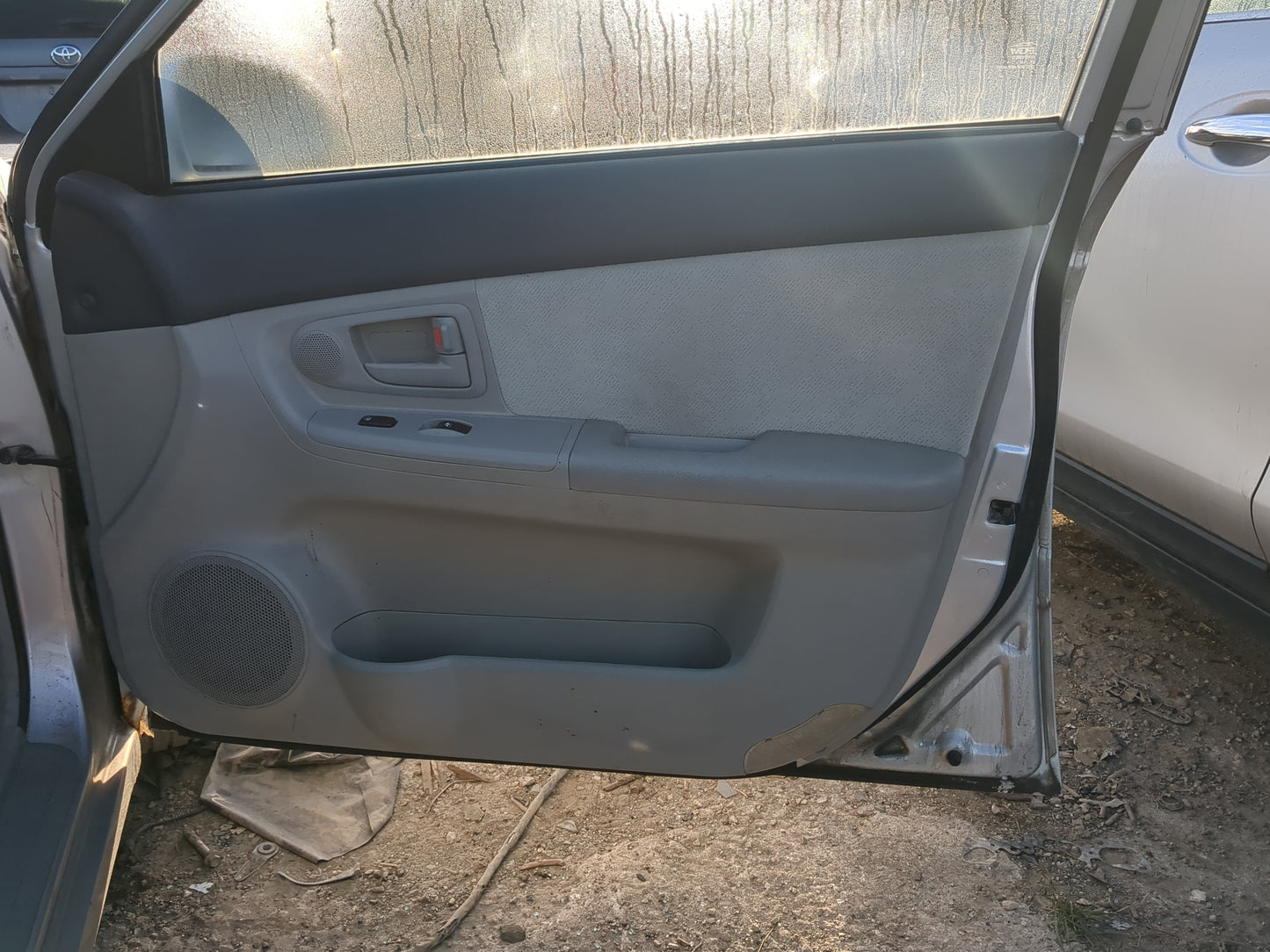 2006 Kia Spectra Front Right Passenger Interior Door Panel Trim - Oemusedautoparts1.com