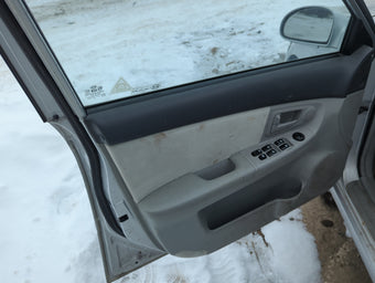 compare product 2006 Kia Spectra Front Left Driver Interior Door Panel Trim 1355745