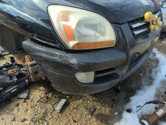 compare product 2005-2008 Kia Sportage Front Bumper - Oem 1372726