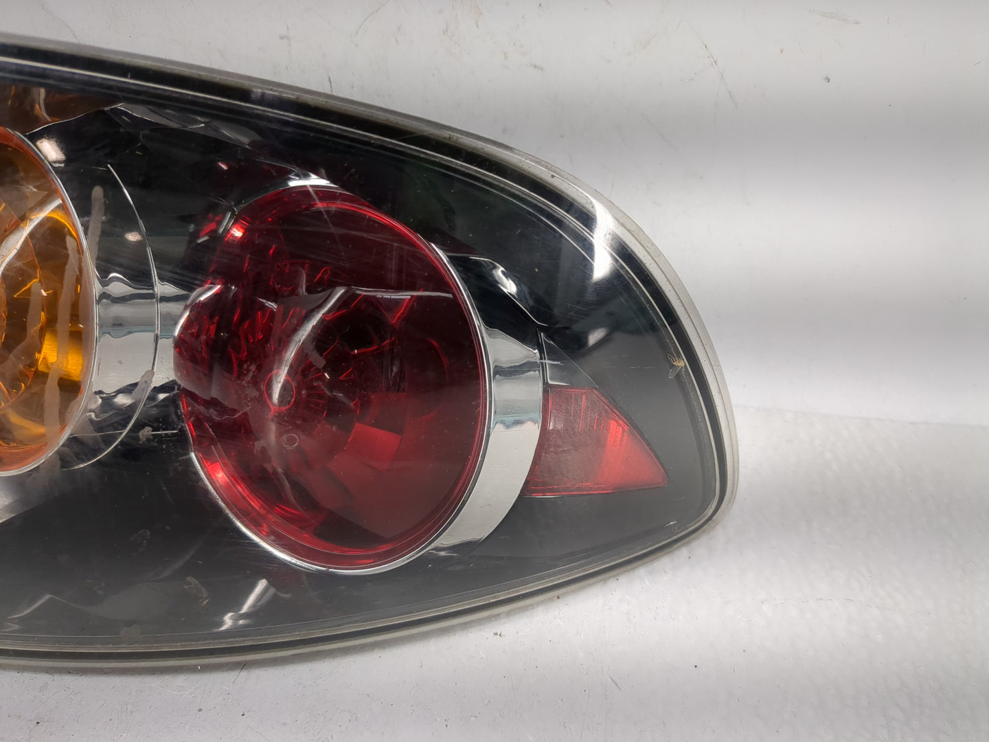 2004-2006 Mazda 3 Tail Light Assembly Driver Left OEM Fits Fits 2004 2005 2006 OEM Used Auto Parts - Oemusedautoparts1.com