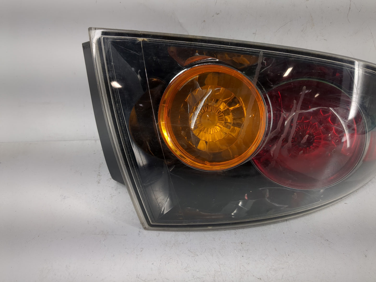 2004-2006 Mazda 3 Tail Light Assembly Driver Left OEM Fits Fits 2004 2005 2006 OEM Used Auto Parts - Oemusedautoparts1.com