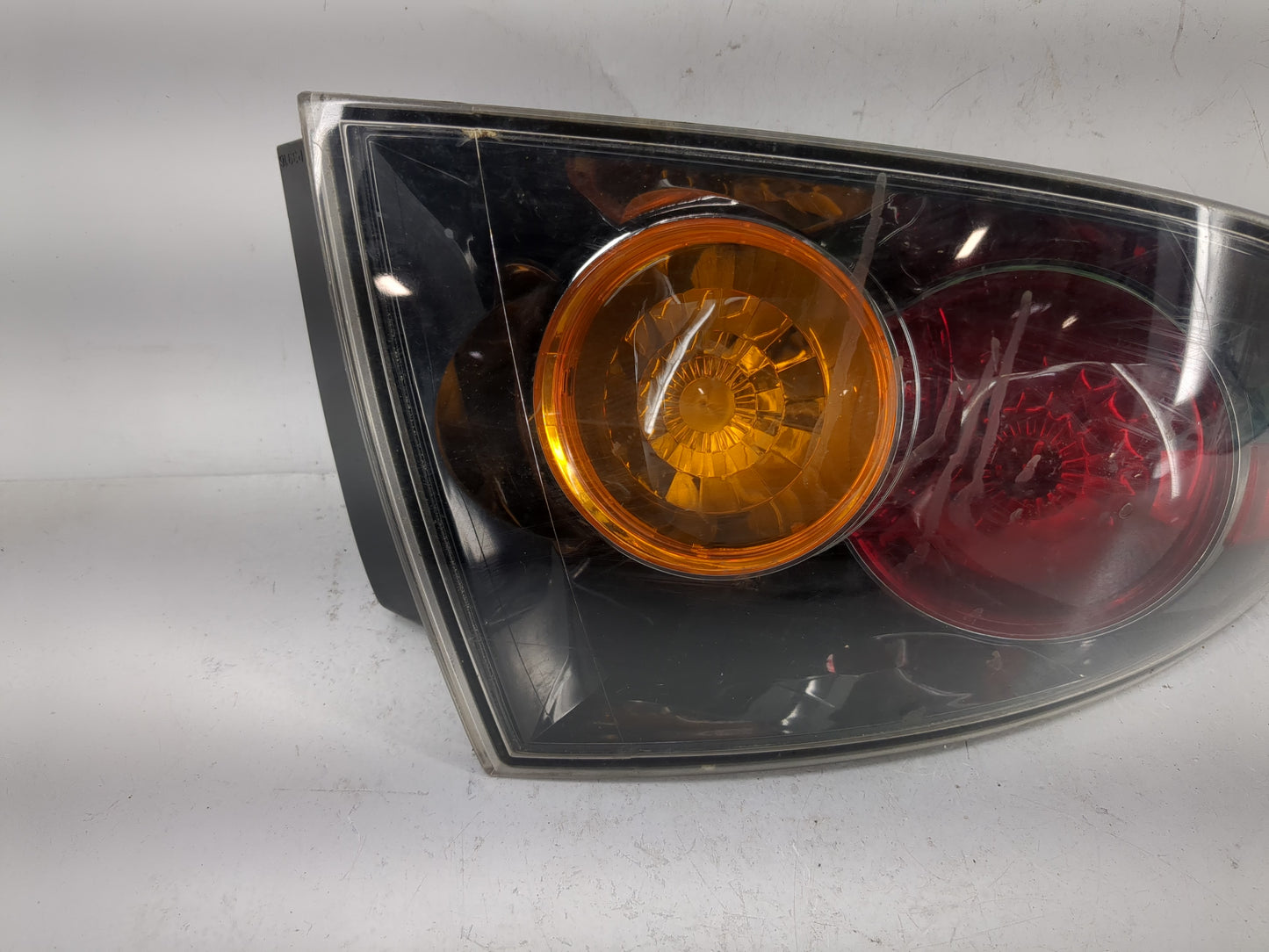 2004-2006 Mazda 3 Tail Light Assembly Driver Left OEM Fits Fits 2004 2005 2006 OEM Used Auto Parts - Oemusedautoparts1.com