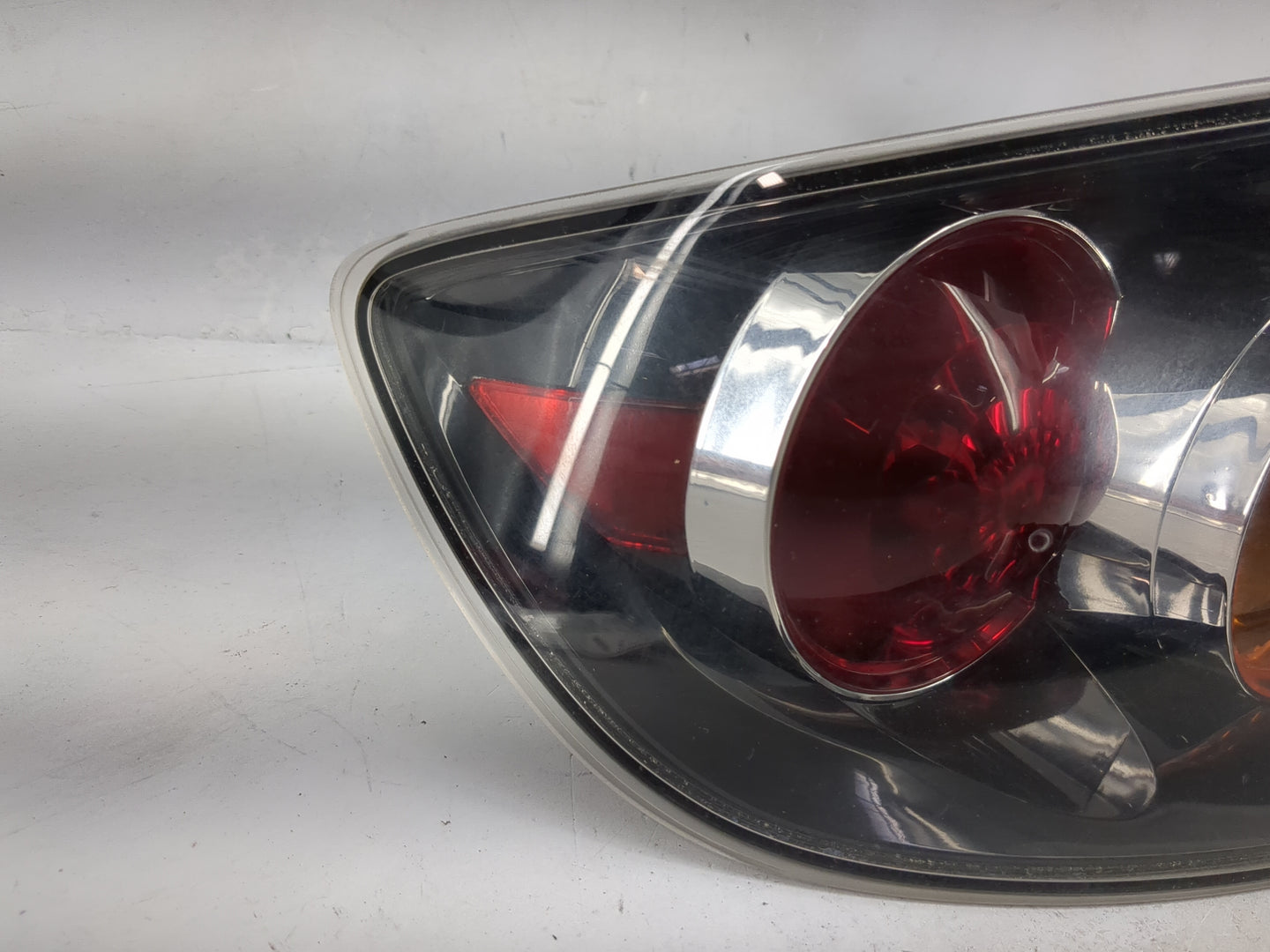 2006 Mazda Mazda3 Tail Light Assembly Driver Left OEM Fits Fits 2004 2005 OEM Used Auto Parts - Oemusedautoparts1.com