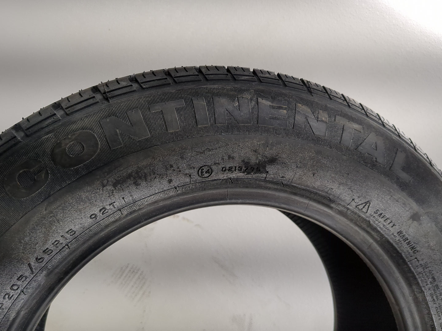 Used Tire P205/65R15 CONTINENTAL TOURING CONTACT AS 92T - Tread Depth 10/32 - Oemusedautoparts1.com