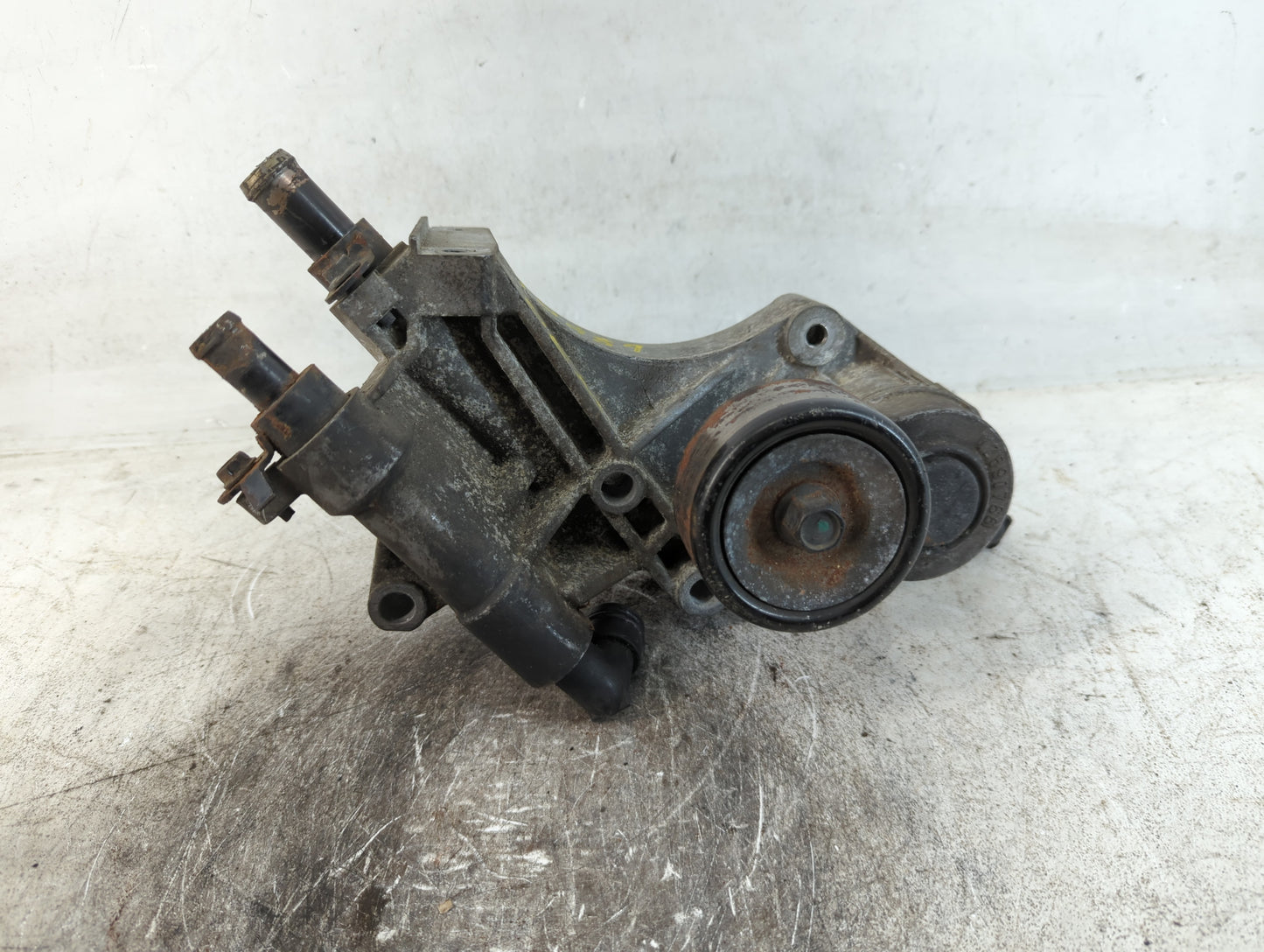 2007 Buick Lucerne WATER PUMP AND BELT BRACKET - Oemusedautoparts1.com