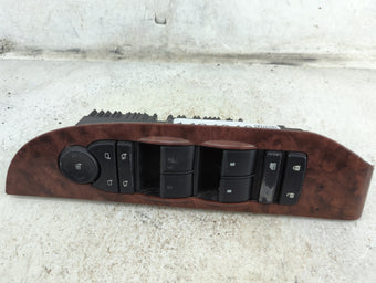 compare product 2007 Chevrolet Suburban Master Power Window Switch Replacement Driver Side Left P/N:15906881 F 00H J00 316, BP688144710703PL Fits OEM Used Auto Parts