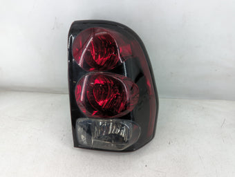 compare product 2002-2009 Chevrolet Trailblazer Tail Light Assembly Passenger Right OEM P/N:15131579 Fits OEM Used Auto Parts