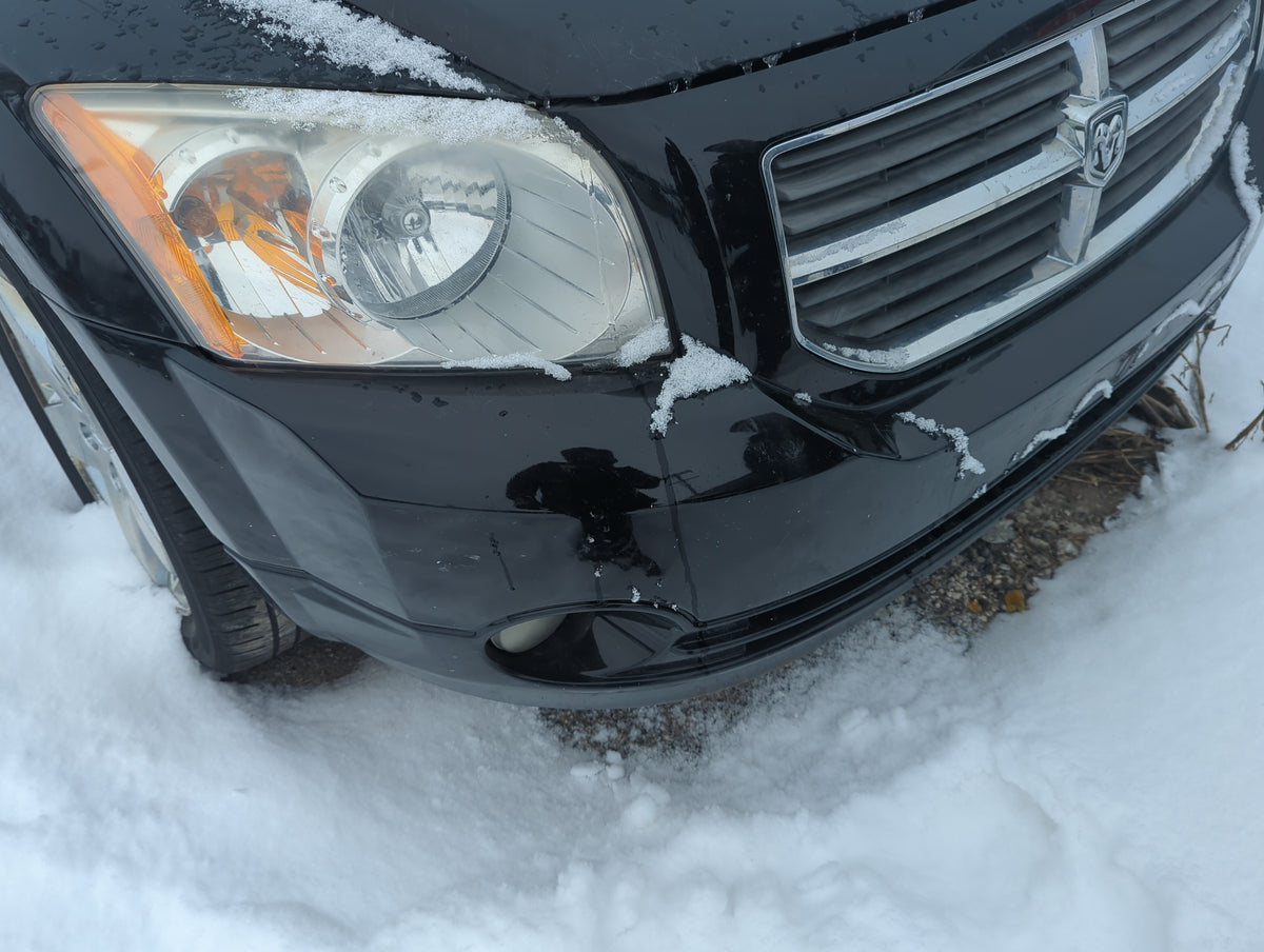 2007-2012 Dodge Caliber Front Bumper - Oem 1352105 - Oemusedautoparts1.com