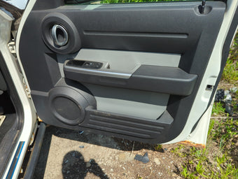 compare product 2007 Dodge Nitro Front Right Passenger Interior Door Panel Trim