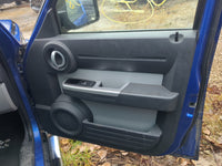 2007 Dodge Nitro Front Right Passenger Interior Door Panel Trim - Oemusedautoparts1.com