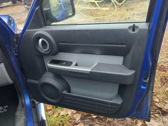 compare product 2007 Dodge Nitro Front Right Passenger Interior Door Panel Trim