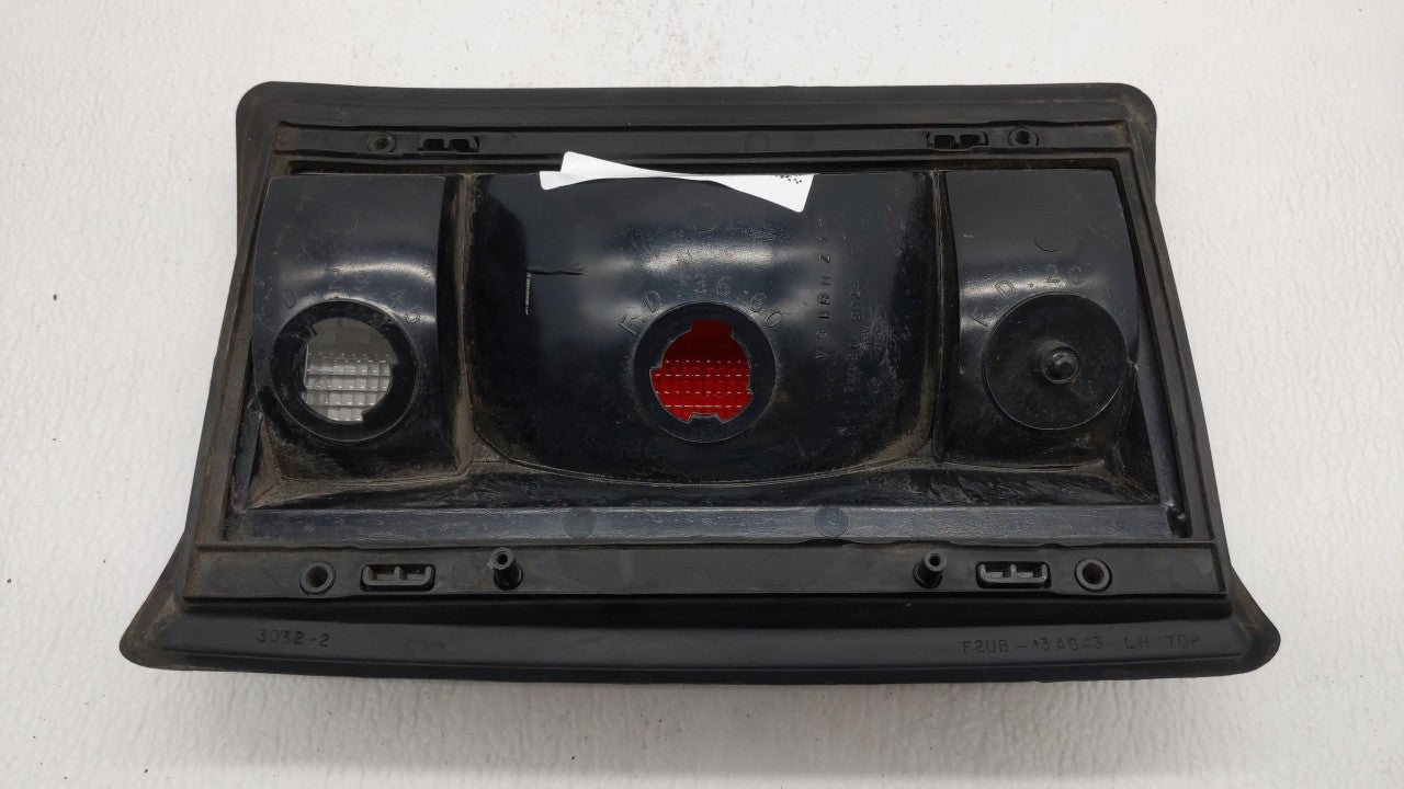 2005 Ford E-350 Club Wagon Tail Light Assembly Driver Left OEM P/N:F7UB 13441 A1 Fits OEM Used Auto Parts - Oemusedautoparts
