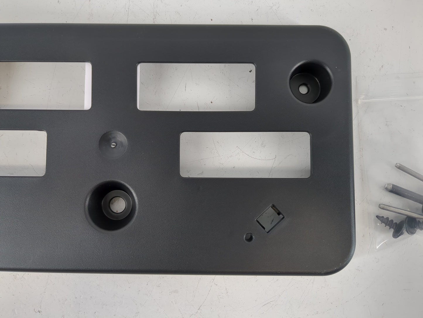 2007 Ford Escape Front License Plate Bracket - Oemusedautoparts1.com