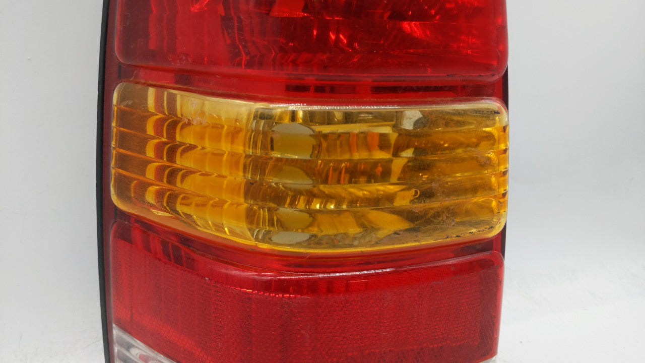 2001-2007 Ford Escape Tail Light Assembly Driver Left OEM P/N:4L84-13B505-D Fits Fits 2001 2002 2003 2004 2005 2006 2007 OEM