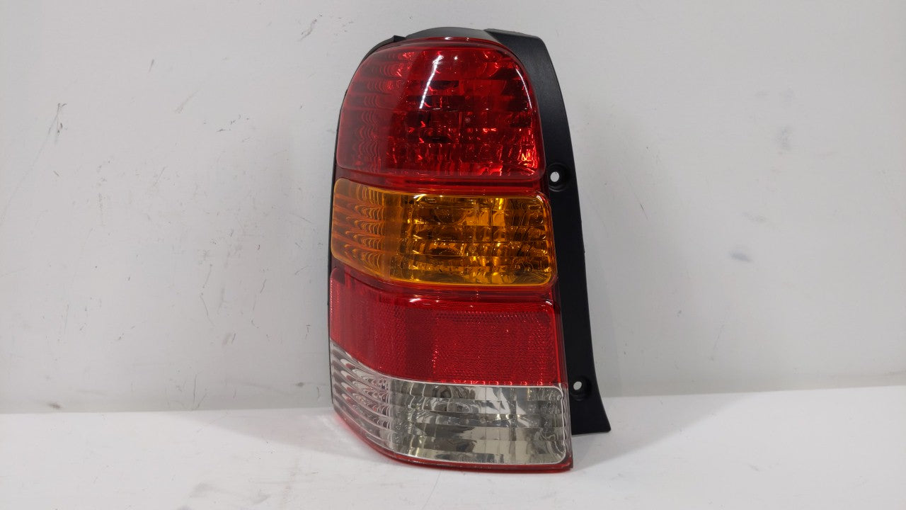 2001-2007 Ford Escape Tail Light Assembly Driver Left OEM P/N:4L84-13B505-D Fits Fits 2001 2002 2003 2004 2005 2006 2007 OEM