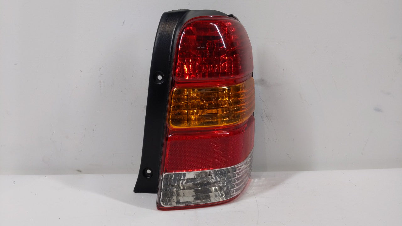 2001-2007 Ford Escape Tail Light Assembly Passenger Right OEM P/N:4L84-13B504-D Fits Fits 2001 2002 2003 2004 2005 2006 2007