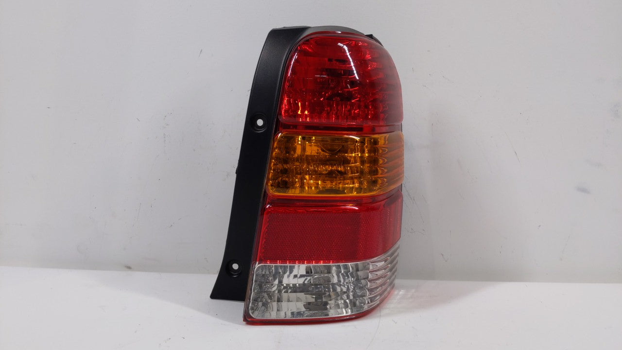 2001-2007 Ford Escape Tail Light Assembly Passenger Right OEM P/N:4L84-13B504-D Fits Fits 2001 2002 2003 2004 2005 2006 2007