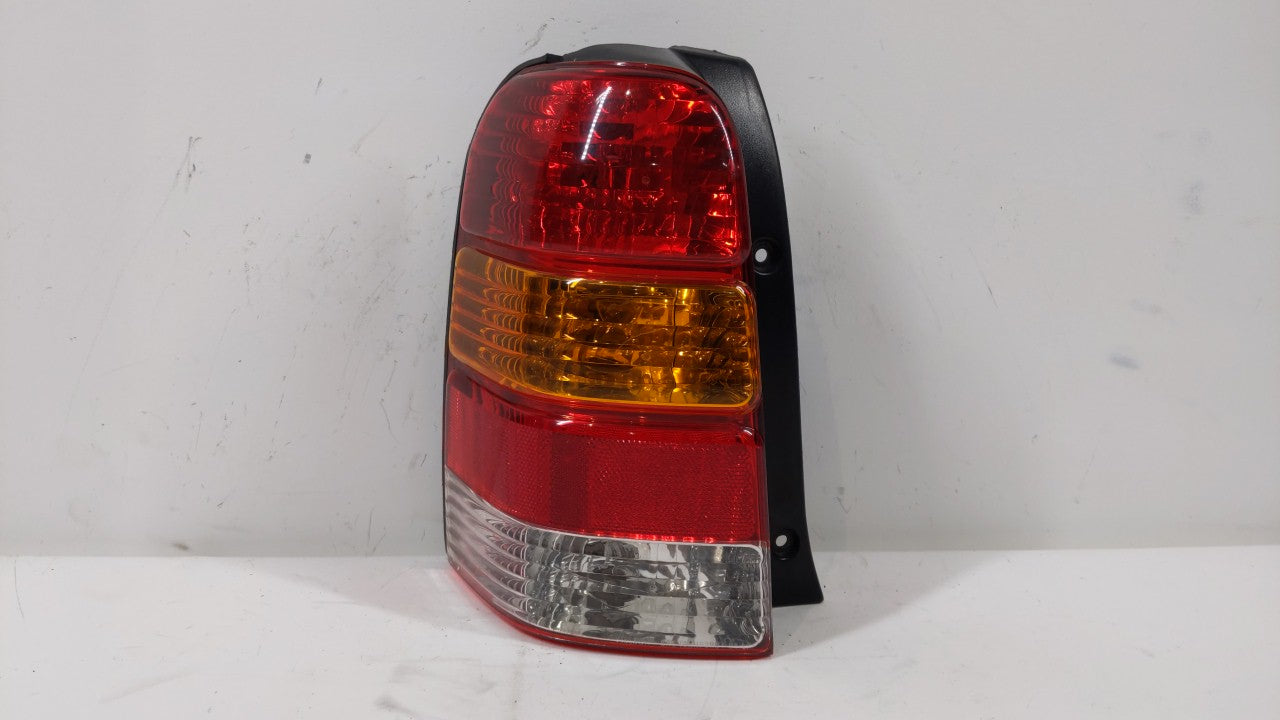 2001-2007 Ford Escape Tail Light Assembly Driver Left OEM P/N:4L84-13B505-D Fits Fits 2001 2002 2003 2004 2005 2006 2007 OEM