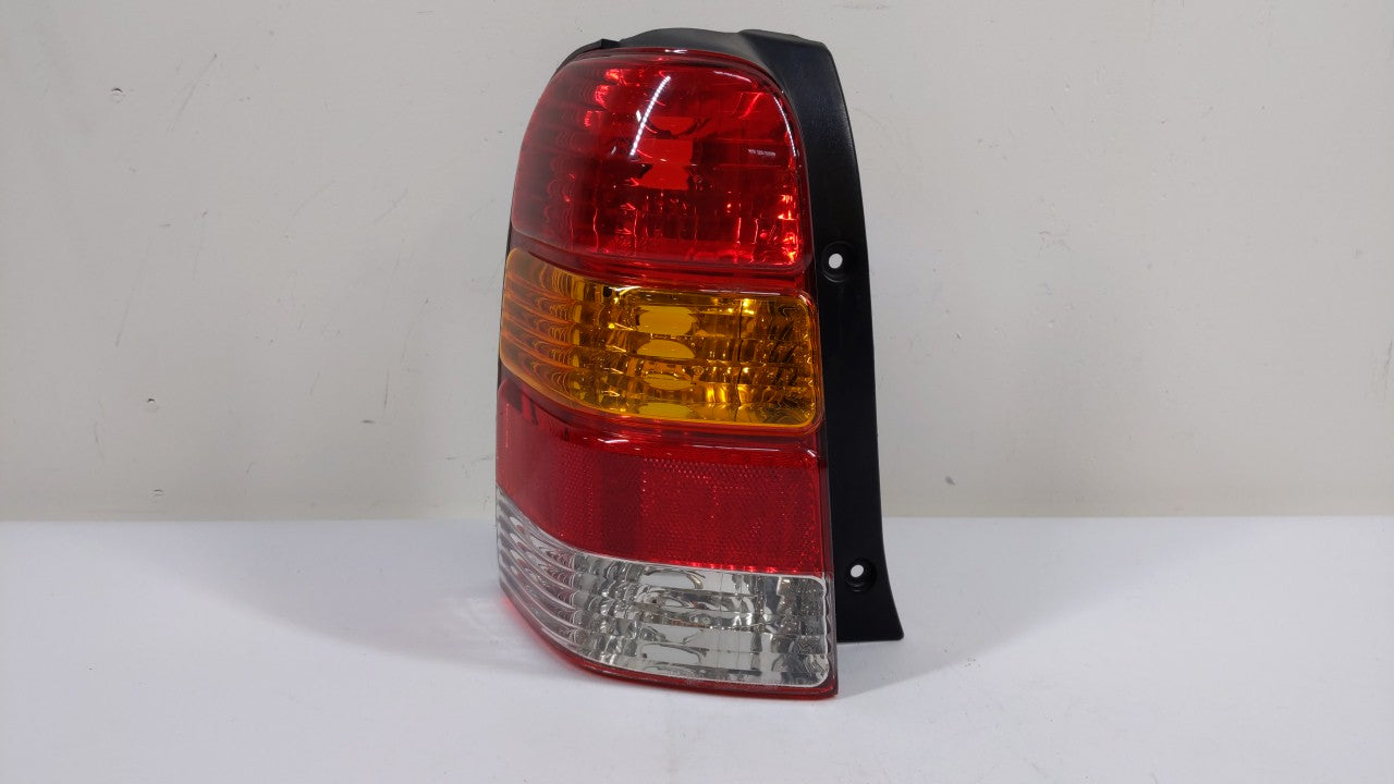 2001-2007 Ford Escape Tail Light Assembly Driver Left OEM P/N:4L84-13B505-D Fits Fits 2001 2002 2003 2004 2005 2006 2007 OEM